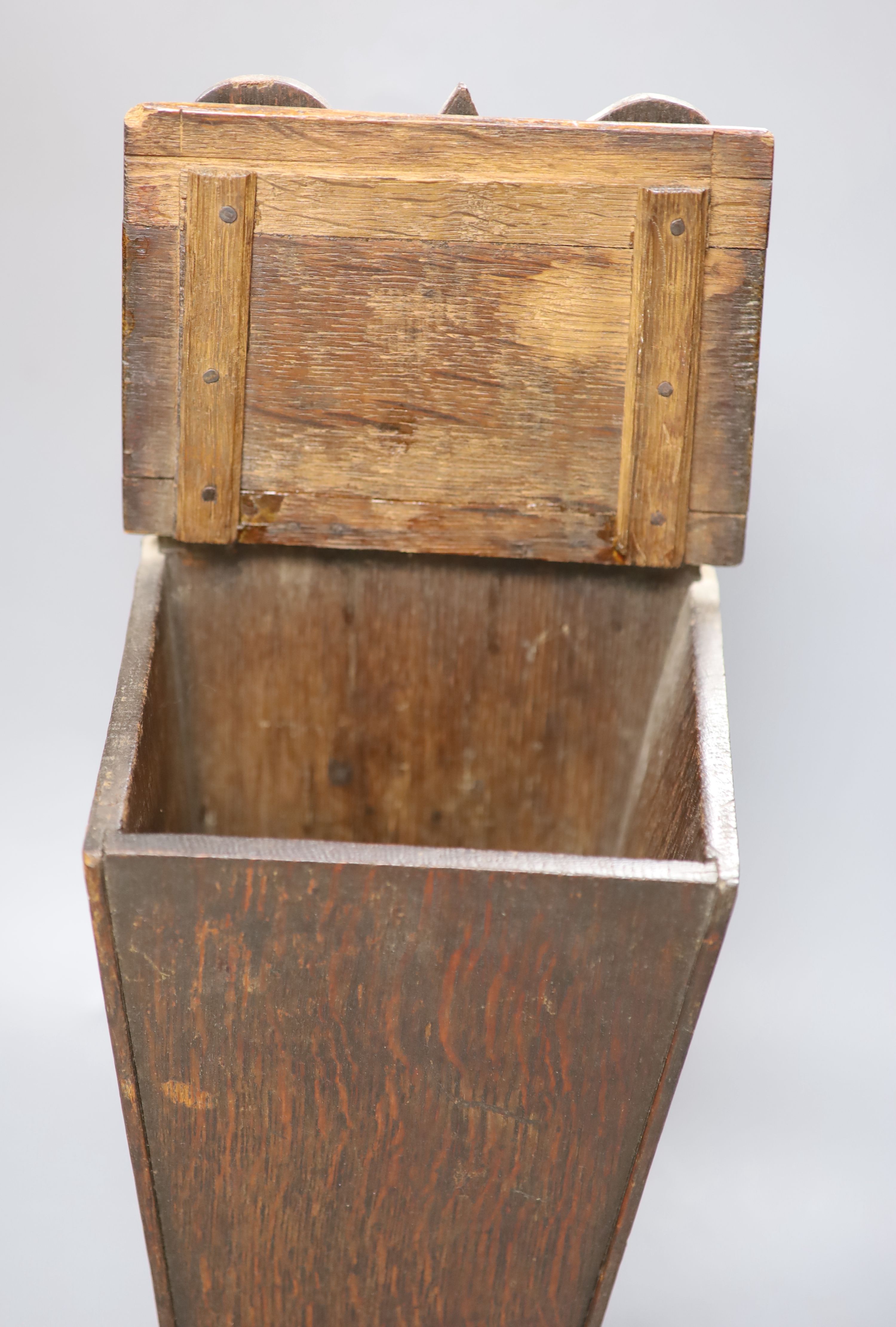 An early 19th century mahogany wall mounting candle box, length 49.5cm